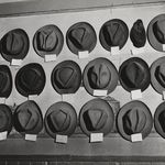 Hats in a pool room on Mulberry Street in 1943.